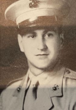 Black and white portrait of a young man in a military uniform and hat.