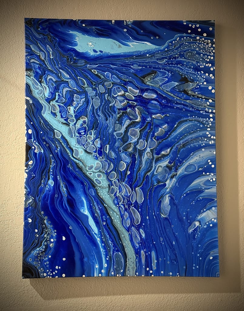 Lorraine Smith, knowing our souls are tethered to the ocean and to each other through scuba and environmentalism, gifted us a beautiful painting she created. It was of beautiful blue and green waters, with vibrant bubbles (also a West Ham reference). It cost a fortune to ship home, but it was a piece of our hearts, waiting for us.